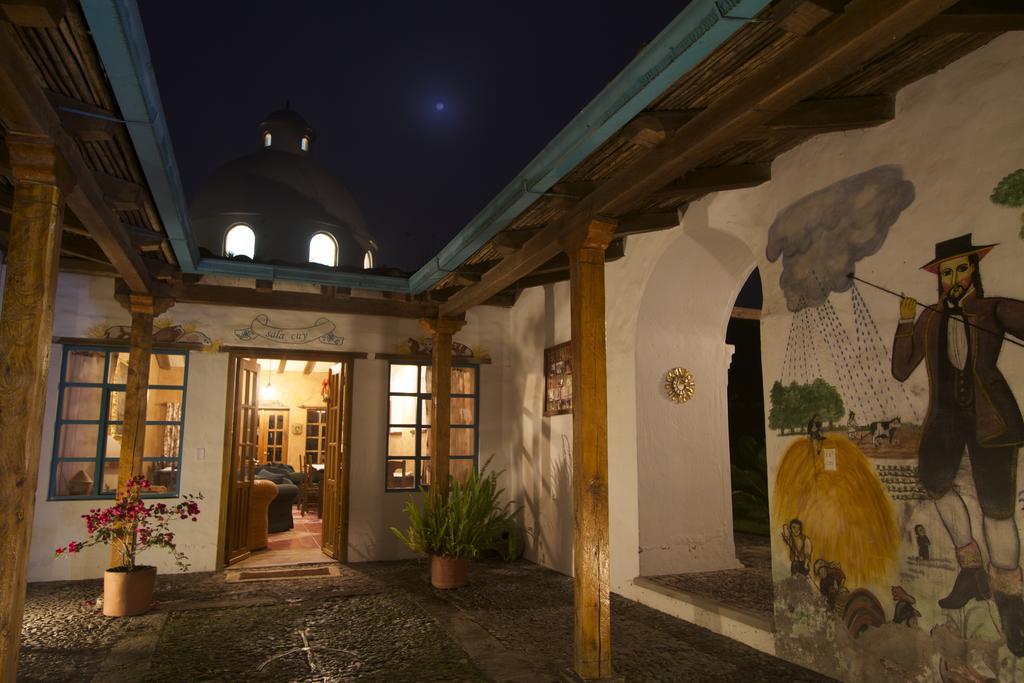 Las Palmeras Inn Otavalo Bagian luar foto